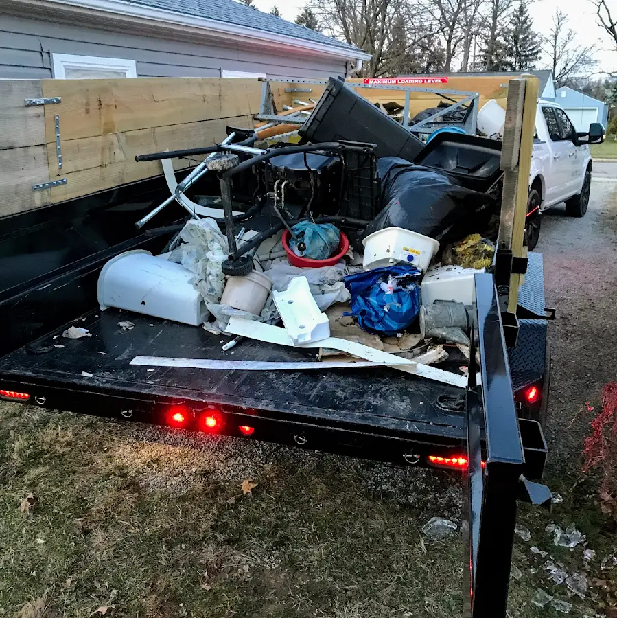 Roll-off dumpster delivered to a residential driveway in Minden